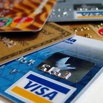 Finance Minister to review credit card fees in Canada