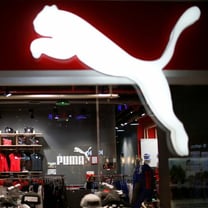 Puma lifts payout with buybacks amid plans for better shoe sales
